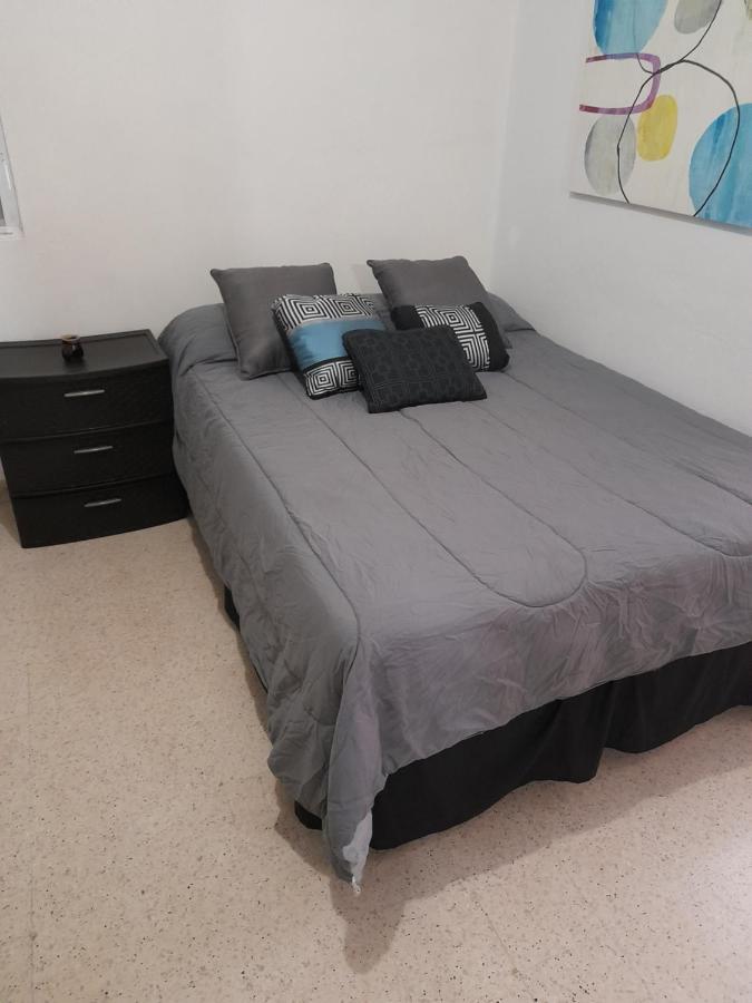 Cozy Apartment Across The San Juan Airport Bagian luar foto